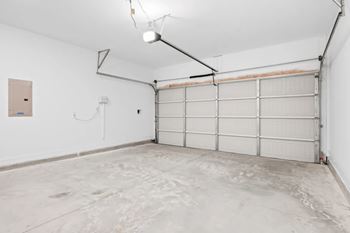 Private driveways and 2-car garages with every home